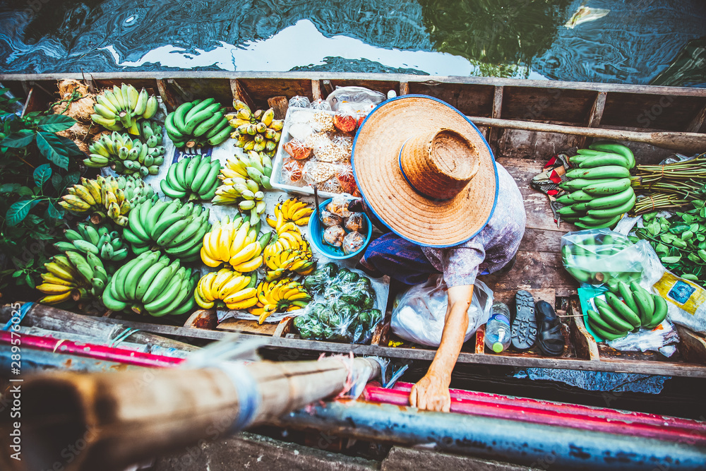 floating market - top view of boat full of fresh fruits on sale - obrazy, fototapety, plakaty 