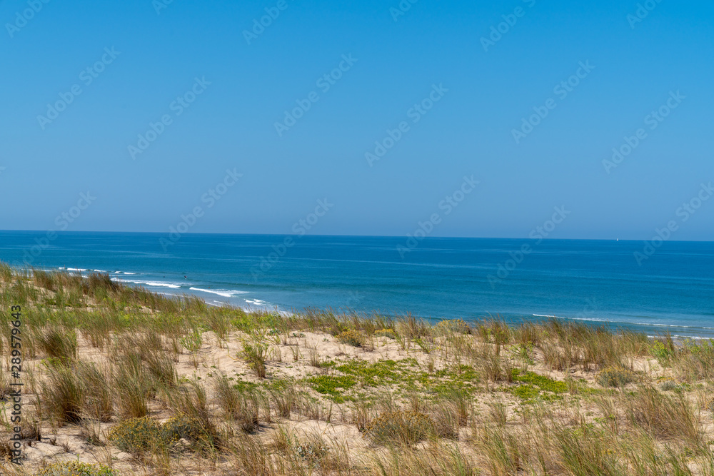 Sandy beach on Le porge village landscape of the Atlantic sea coast of France