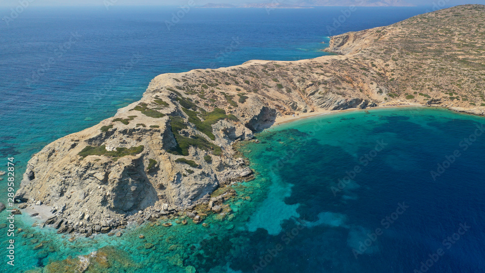 Fototapeta premium Aerial drone photo of secluded paradise beach of Gramvousa in small island of Gramvousa near Kalotaritissa with emerald clear sea, Amorgos island, Cyclades, Greece