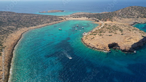 Aerial drone photo of paradise beach of Kalotaritissa with emerald clear sea, Amorgos island, Cyclades, Greece photo