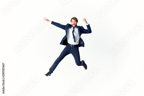 happy businessman jumping in the air