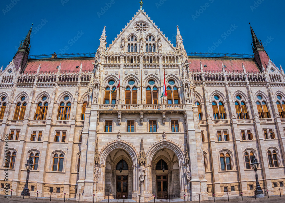 Budapest, Hungary - August 29, 2019:Hungarian Parliament building in the city of Budapest. A sample of neo-gothic architecture, Budapest's tourist attraction