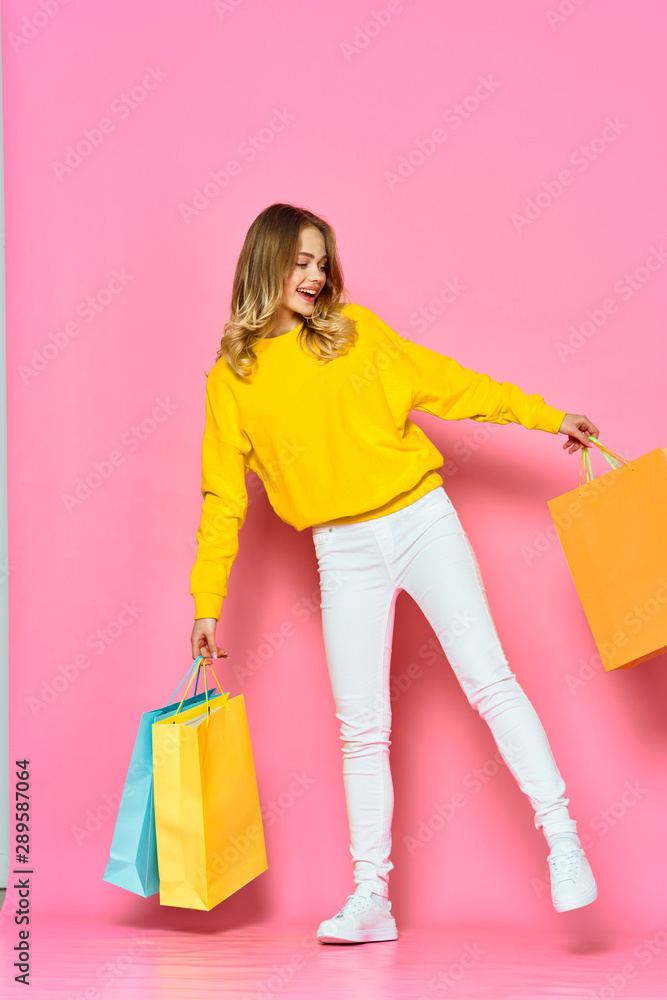 young woman with shopping bags