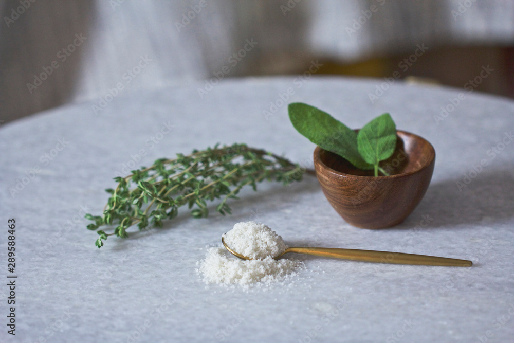 Herb Leaves in Bowl with Parmesan Cheese in Bowl Herb Leaves in Bowl with Parmesan Cheese in Bowl