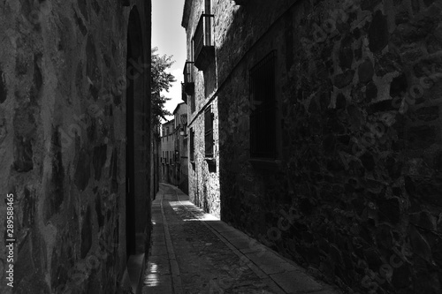 Narrow street of C  ceres in black and white
