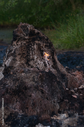 Mud volcano Starunya emits flames photo