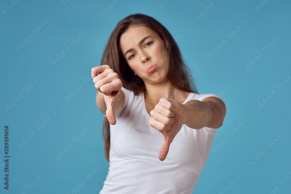 Fototapeta premium young woman with thumbs up