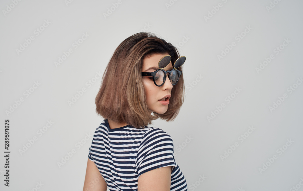 portrait of young woman in sunglasses portrait of young woman in sunglasses