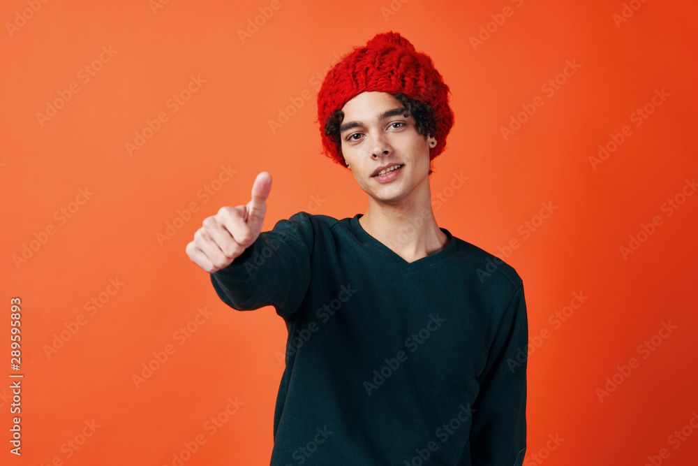 young man with thumbs up young man with thumbs up