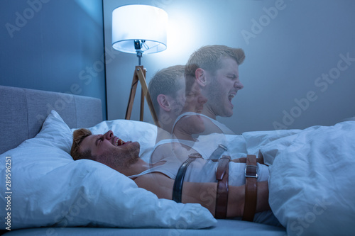 Foto Man Suffering From Sleep Paralysis