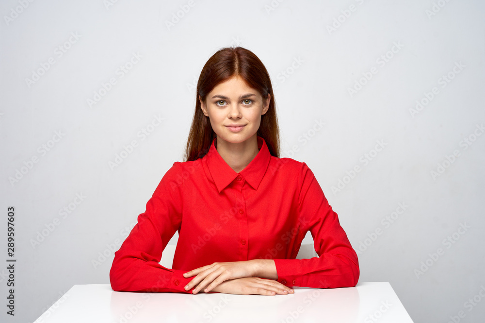 portrait of young woman sitting on sofa portrait of young woman sitting on sofa