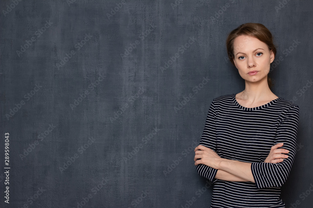 Portrait of serious and focused girl holding arms folded Portrait of serious and focused girl holding arms folded