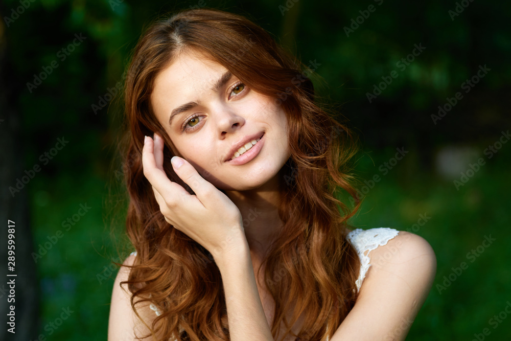 portrait of young woman talking on mobile phone portrait of young woman talking on mobile phone