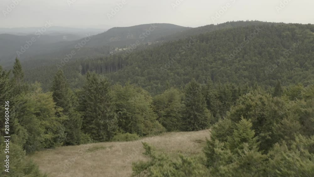 aerial view over mountains in Velke karlovice beskydy czech, This clip is available in two different gradings , 10bit color or dji color lut aerial view over mountains in Velke karlovice beskydy czech, This clip is available in two different gradings , 10bit color or dji color lut