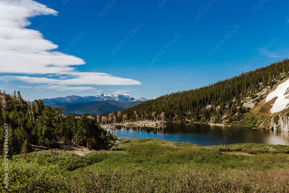 Alpine lake and mountain views from a ridge