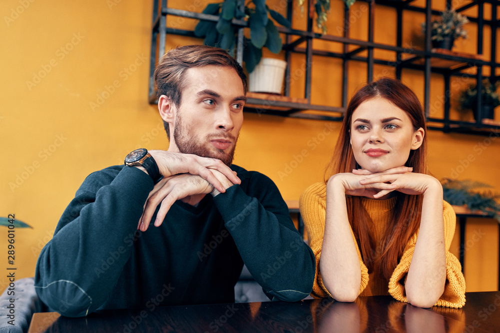 man and woman talking on the phone