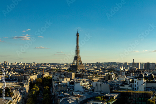 Panoramic view of Paris with the Eiffel Tower in the center of the panorama. Eiffel Tower on the background of Paris buildings. © Igor Kirchevsky