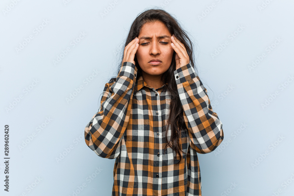 Young cool indian woman touching temples and having headache. Young cool indian woman touching temples and having headache.