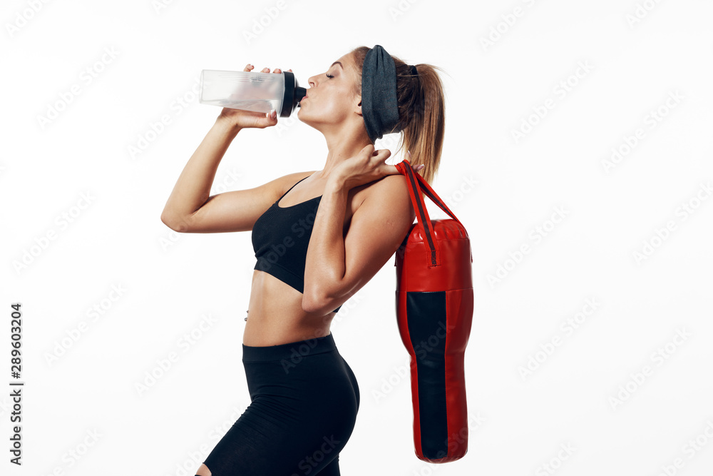 woman with bottle of water isolated on white