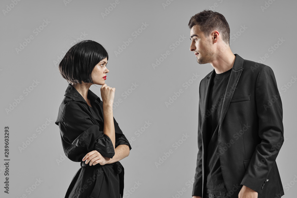 man and woman fighting over white background man and woman fighting over white background