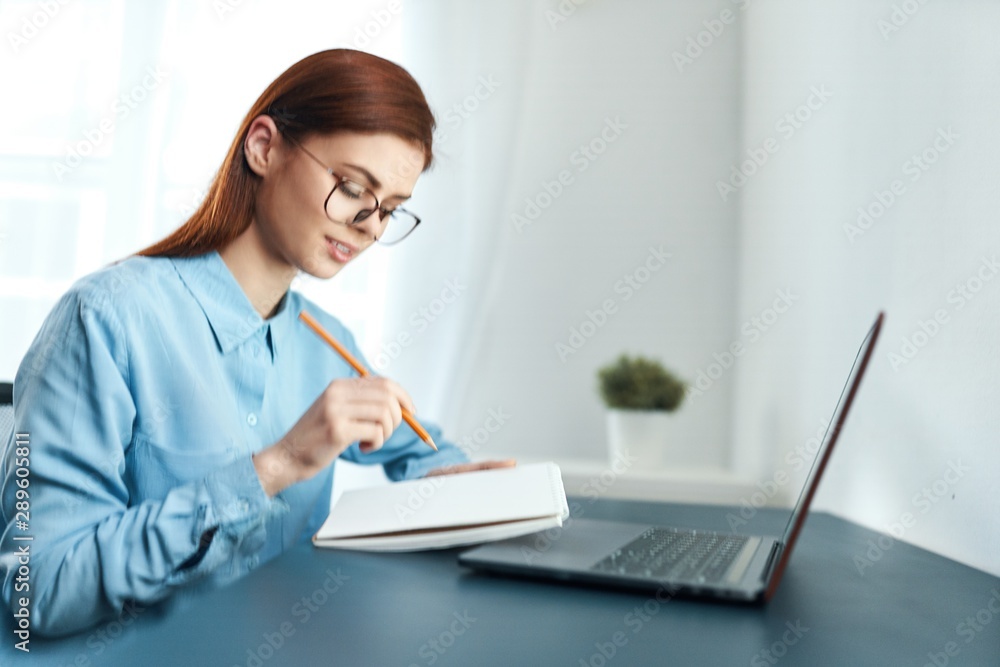 female doctor working on laptop in office female doctor working on laptop in office