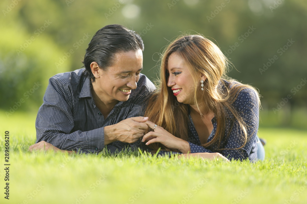 couple in love in park, smiling and friendly, walking, kissing couple in love in park, smiling and friendly, walking, kissing