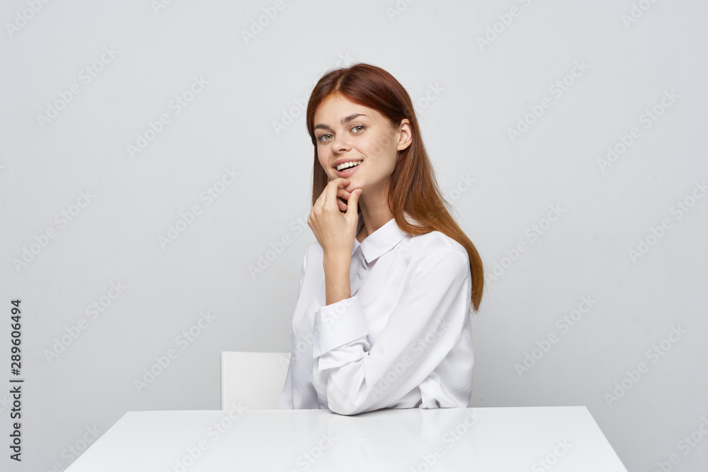 business woman sitting at desk with laptop business woman sitting at desk with laptop
