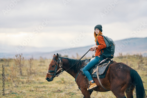 young woman riding horse © SHOTPRIME STUDIO