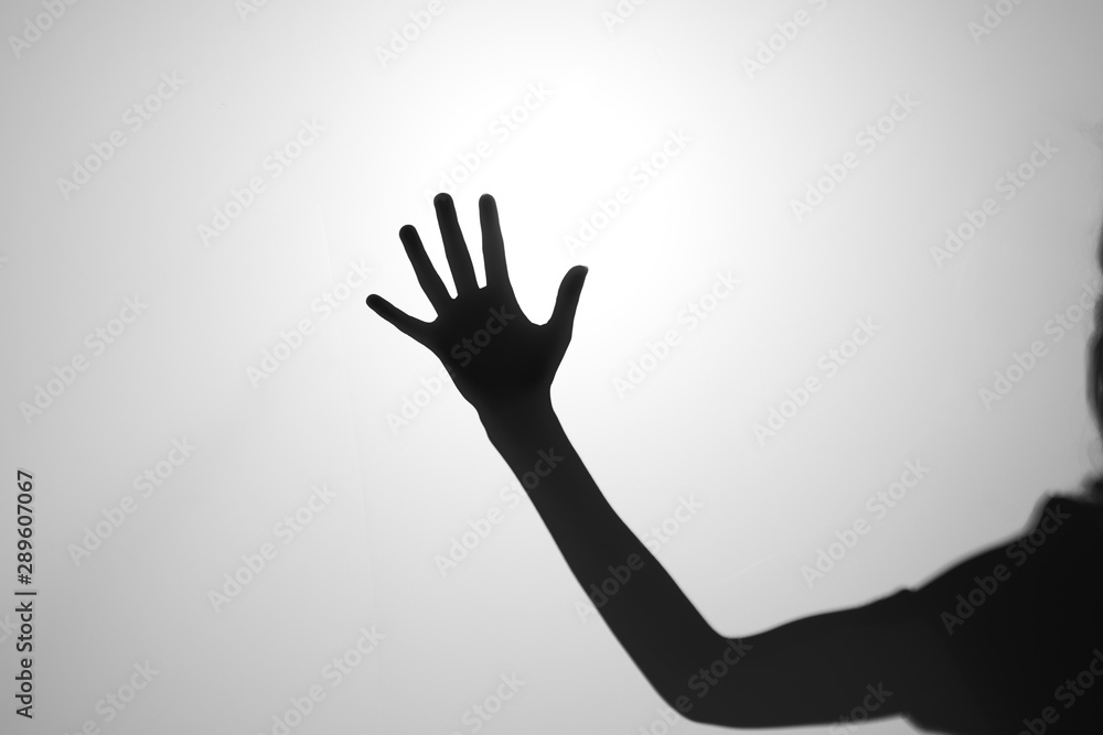 silhouette of human hands