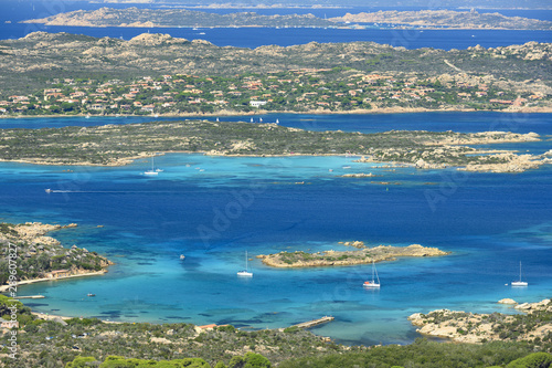 Fototapeta Naklejka Na Ścianę i Meble -  View from above, stunning aerial view of La Maddalena Archipelago with its beautiful bays bathed by a turquoise clear water. La Maddalena Archipelago, Sardinia, Italy.