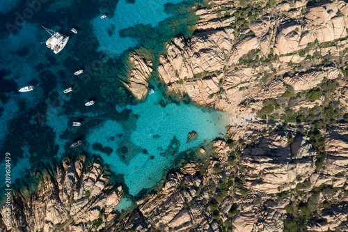View from above, Stunning aerial view of Cala Coticcio also known as Tahiti with its rocky coasts and small beaches bathed by a turquoise clear water. La Maddalena Archipelago, Sardinia, Italy.