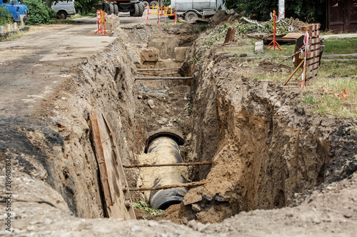 replacement of a sewer pipe deep under the ground