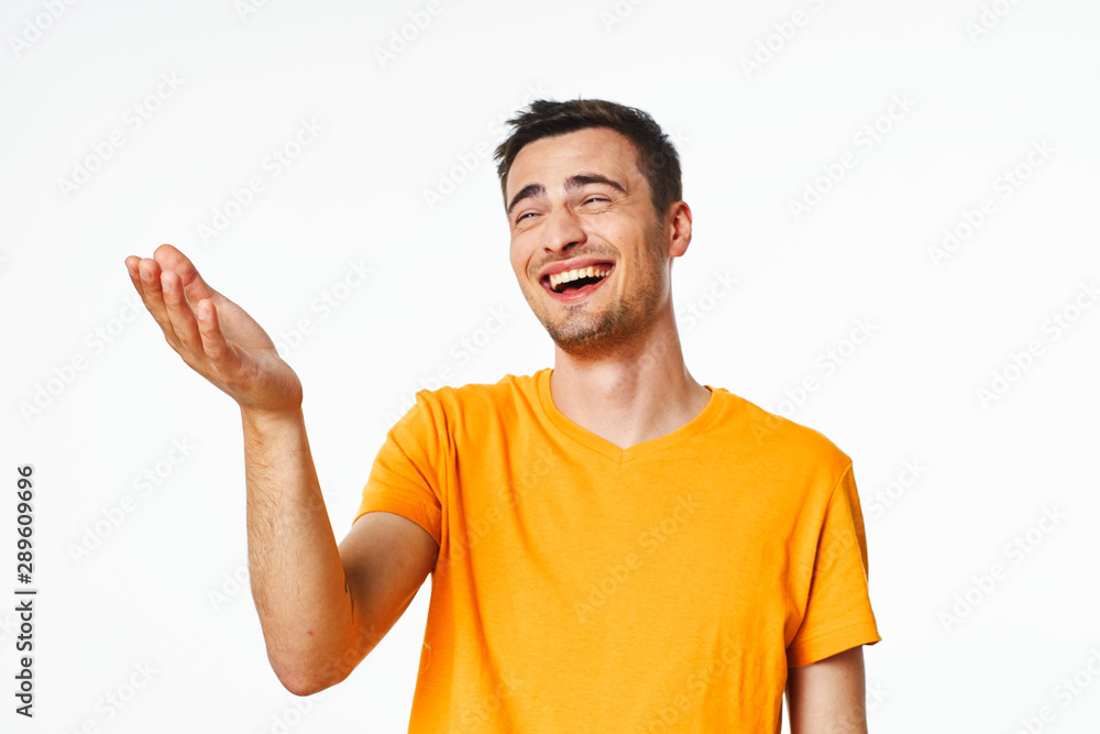 young man showing thumbs up sign young man showing thumbs up sign