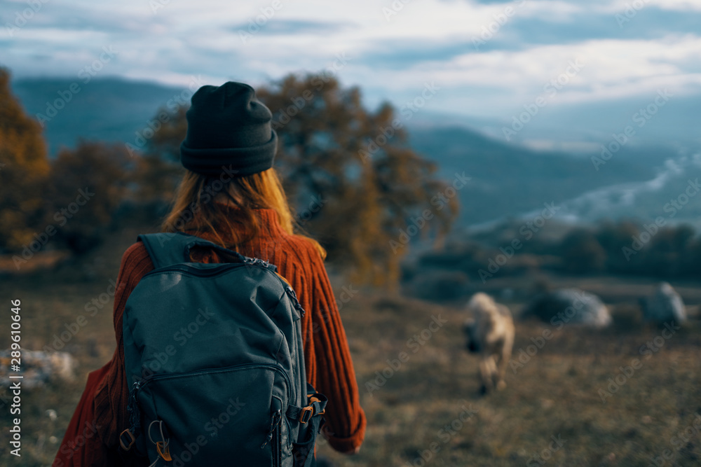 woman hiking in the mountains woman hiking in the mountains