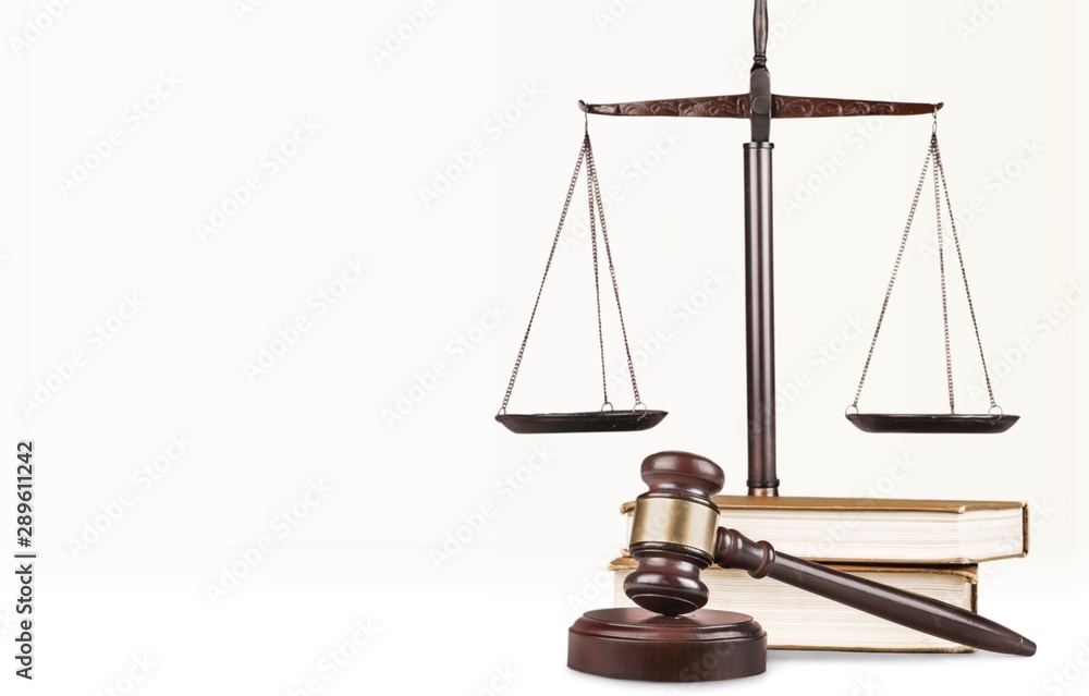 Justice Scales and books and wooden gavel on table. Justice concept Justice Scales and books and wooden gavel on table. Justice concept