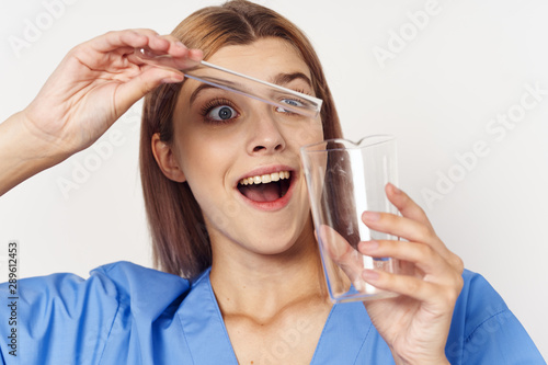 woman with magnifying glass of water