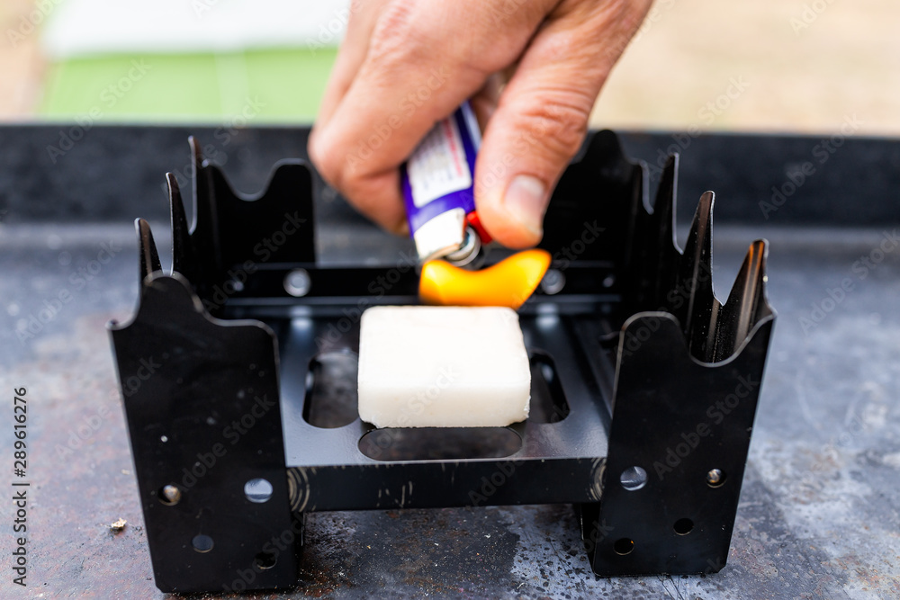 custom made wallpaper toronto digitalCampsite with closeup of hand light camp stove hexamine fuel tablet in Canyon Rim Campground in Flaming Gorge Utah National Park