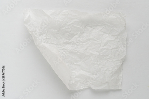 crumpled piece of cooking or baking paper  on the table, mockup