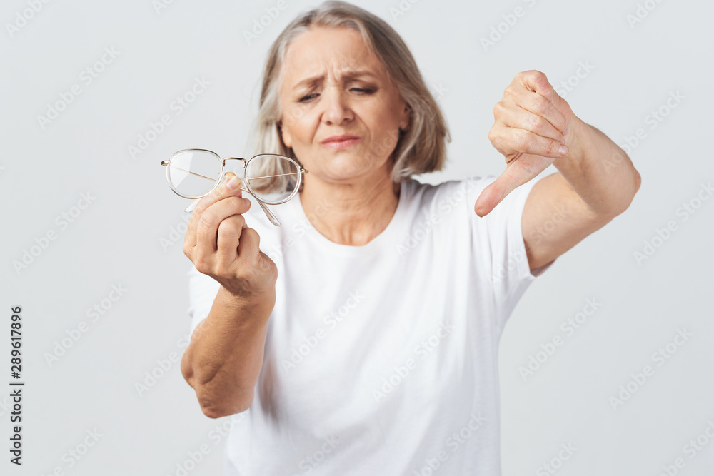 woman with magnifying glass of water isolated on white woman with magnifying glass of water isolated on white