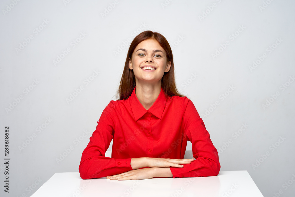 young woman sitting on the floor and reading a book young woman sitting on the floor and reading a book