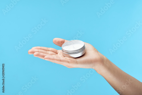 pills in hand isolated on white