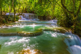 Tad Kwang Sri Waterfall , Luang Prabang Province Laos these waterfalls are a favorite side trip for tourists in Luang Prabang. The falls begin in shallow pools atop a steep hillside.  P