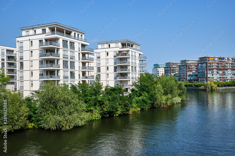 New apartment buildings at the waterfront of the river Spree in Berlin, Germany