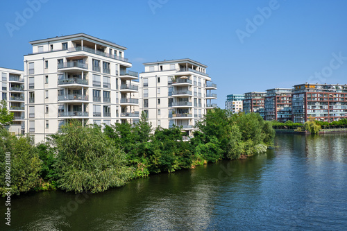New apartment buildings at the waterfront of the river Spree in Berlin, Germany