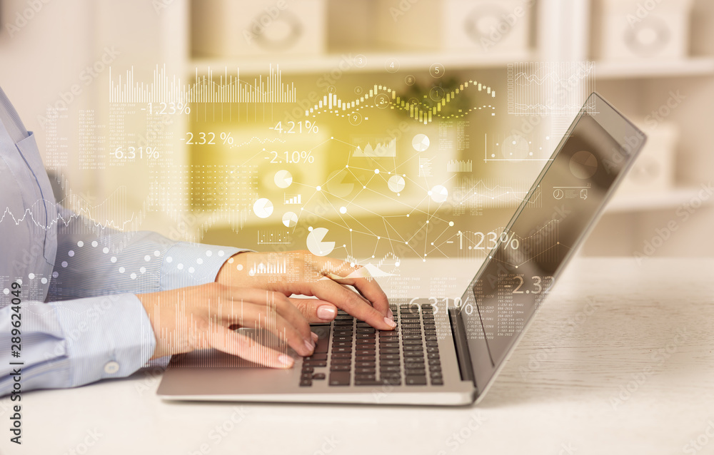 Business woman in homey environment using laptop with financial report concept Business woman in homey environment using laptop with financial report concept