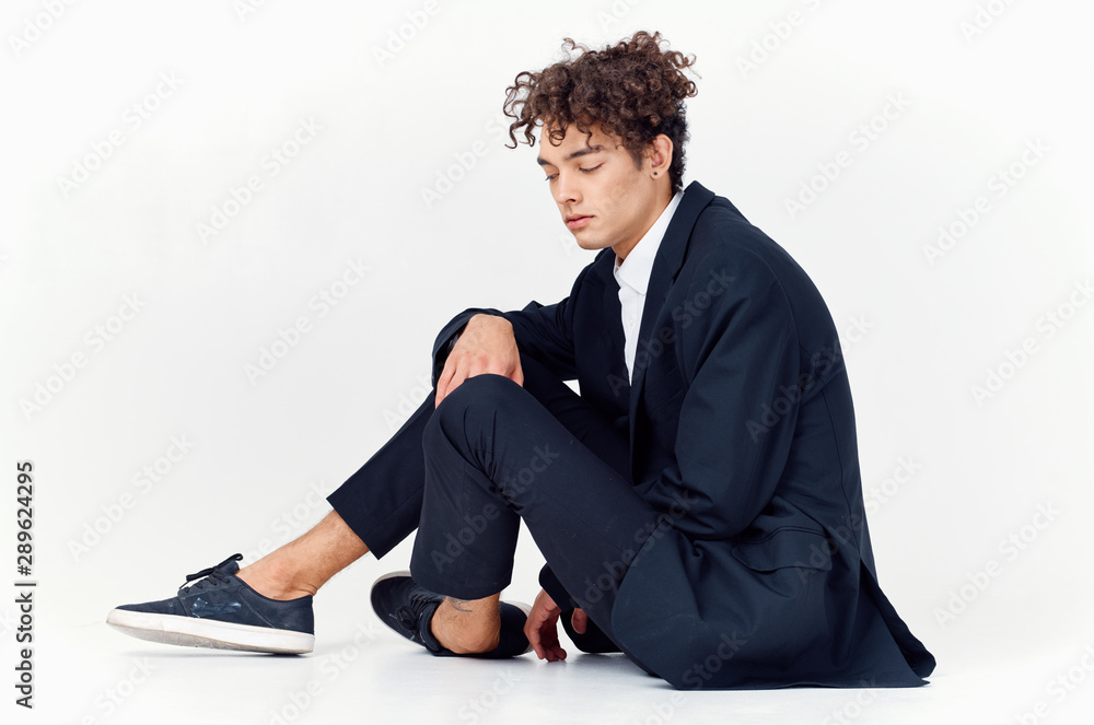 businessman sitting on the floor with laptop businessman sitting on the floor with laptop