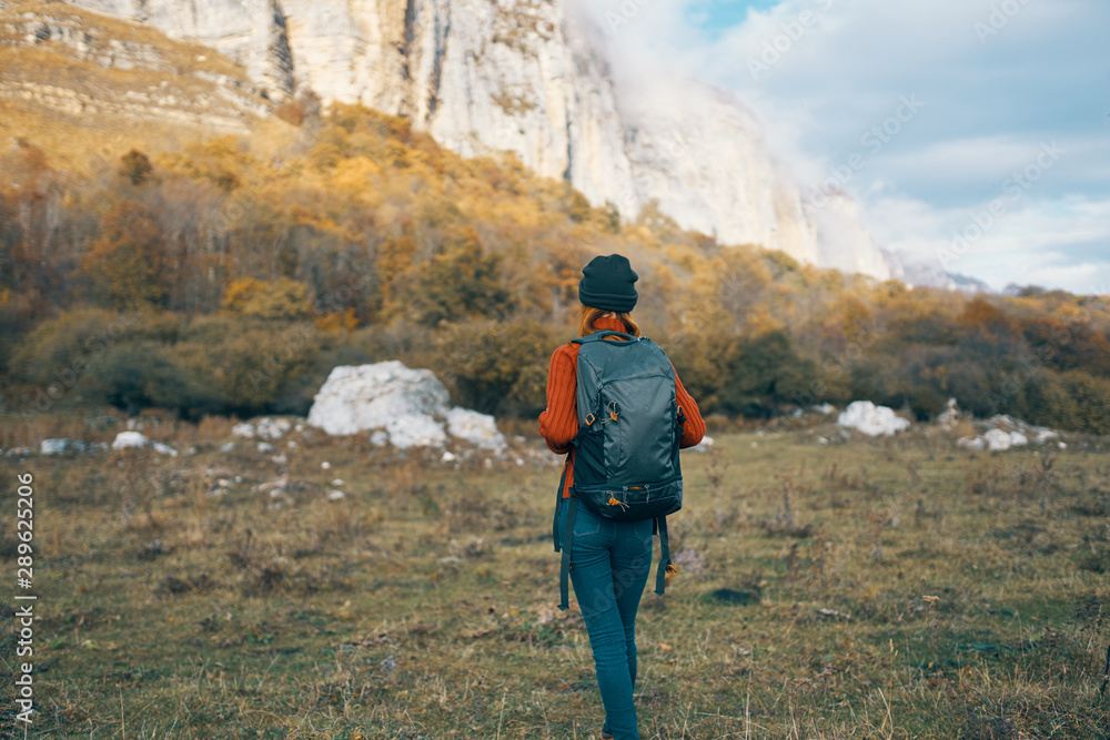 hiker on the top of mountain