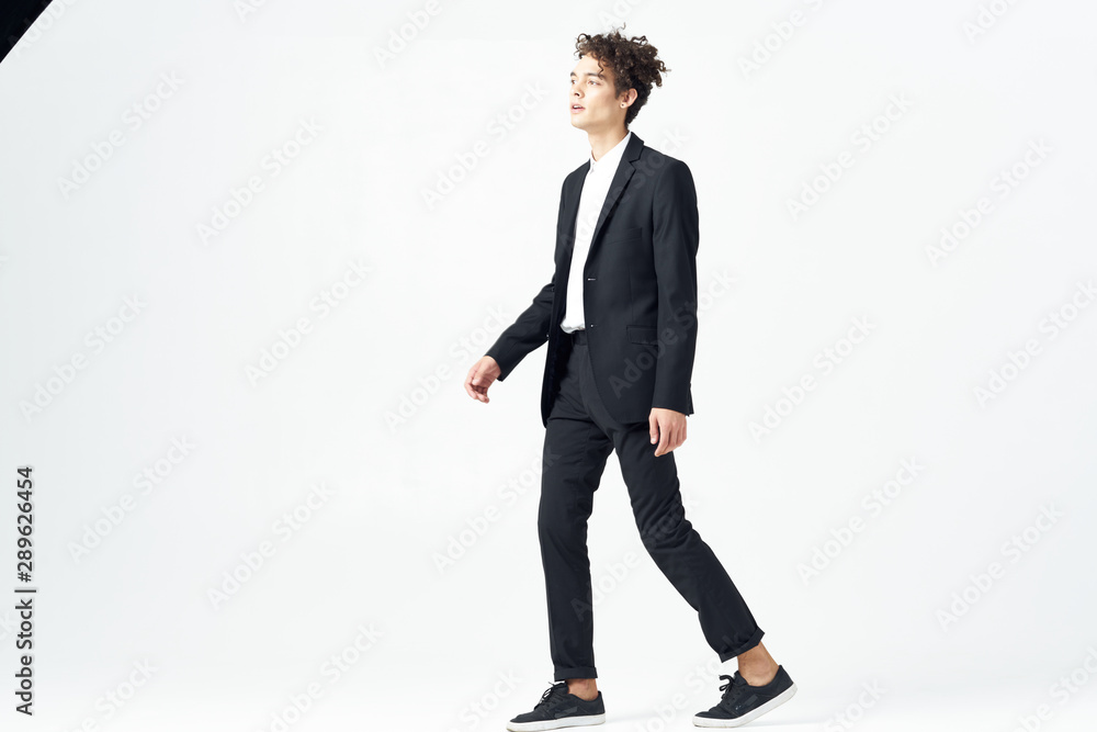 full length portrait of businessman standing with his hands in pockets full length portrait of businessman standing with his hands in pockets