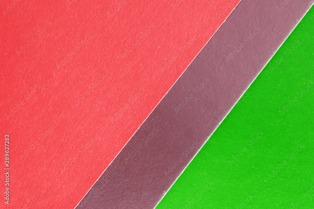 Fototapeta premium Colorful sheets of paper close up, top view. Abstract background
