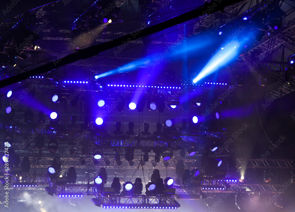 Obraz premium Blue light on a rock concert stage as background